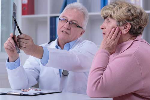 senior woman consulting with her doctor