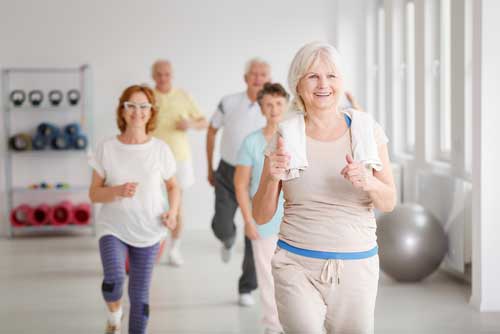 senior citizens enjoying an exercise class