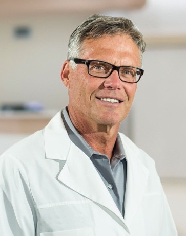 Dr Gerhauser in medical attire