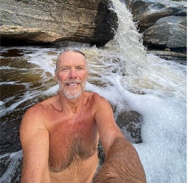 Dr Gerhauser in a waterfall