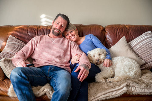 man and woman on couch